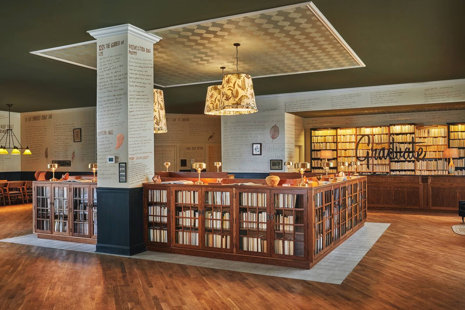 The library-inspired lobby at Graduate by Hilton Iowa City